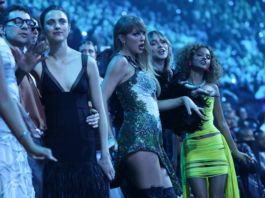 Taylor Swift dances with Suki Waterhouse during Katy Perry’s performance at 2024 VMAs